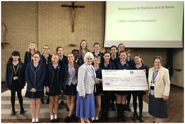 Sisters with ODNs Cobham Outreach Charity Cheque