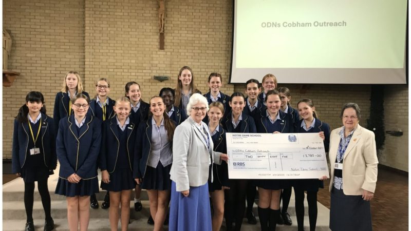 Sisters with ODNs Cobham Outreach Charity Cheque